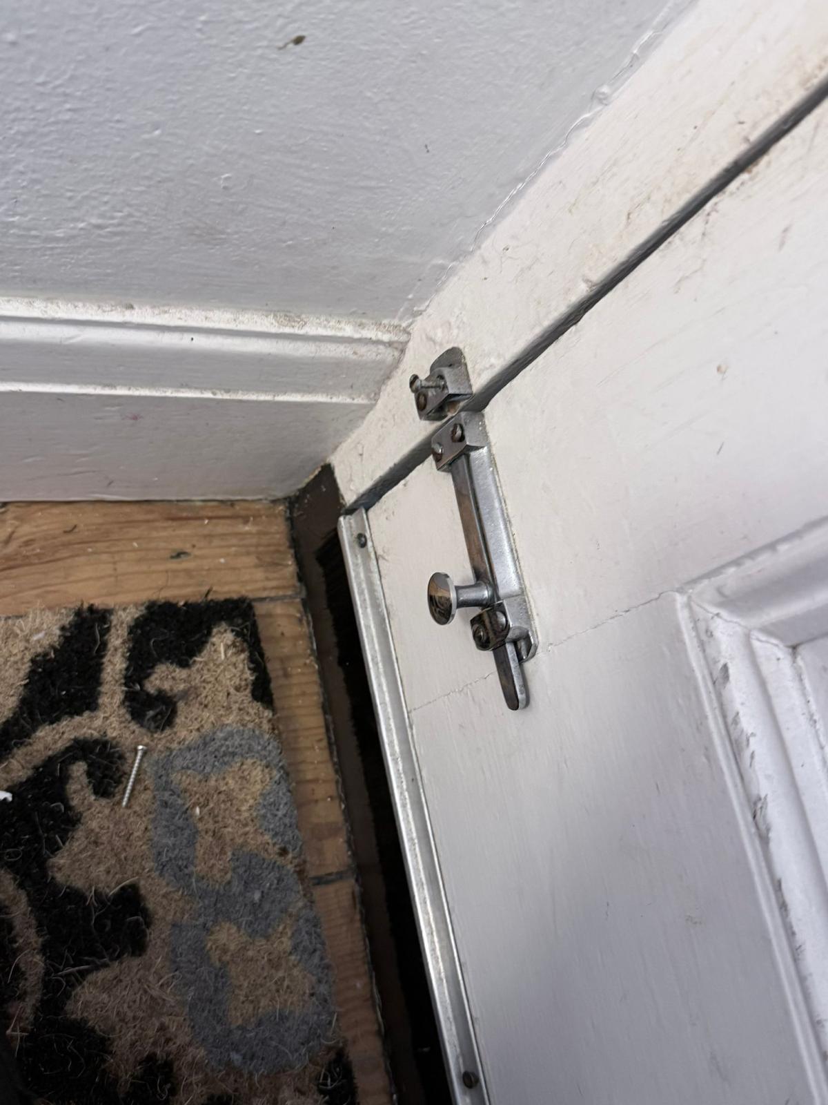 Master Lock key safe fitted beside a front door